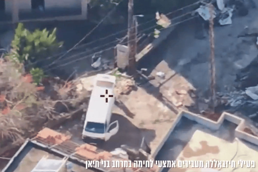Hezbollah operatives spotted transferring weapons in southern Lebanon, shortly before an airstrike. Photo: IDF Spokesperson's Unit footage.